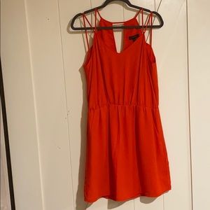 Strapy cocktail dress with pockets
